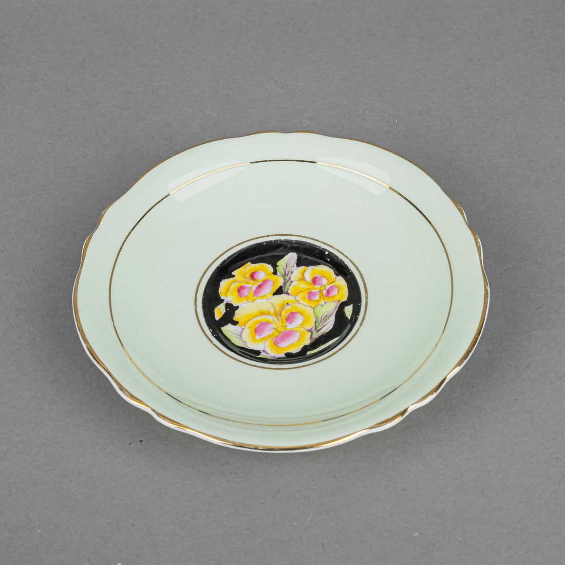 PARAGON Hand-Painted Pansies, Black Ground Cup & Saucer G6600