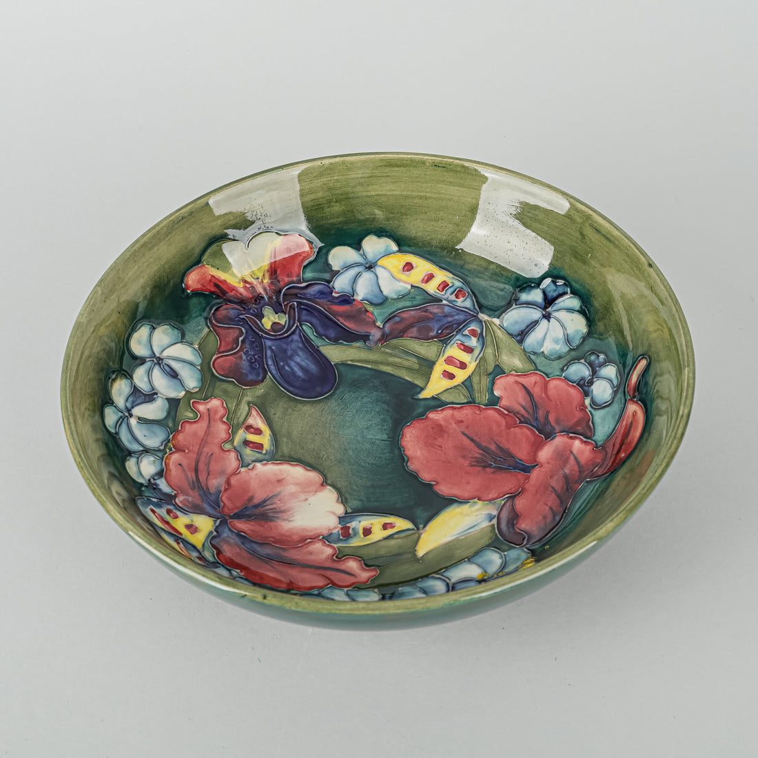 MOORCROFT Orchid Green/Blue Ground Footed Bowl