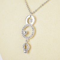 SWAROVSKI Silver Tone Circle Pendant Necklace