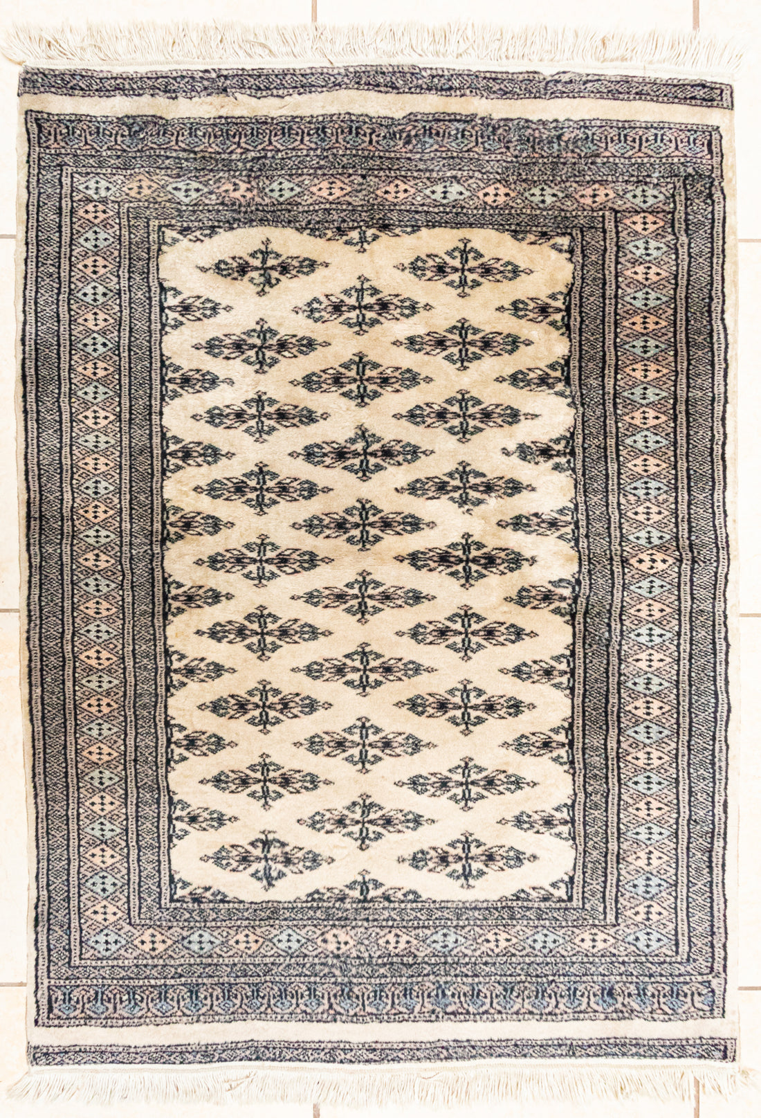 Hand Knotted Wool Bokhara Style Rug         48"x33"