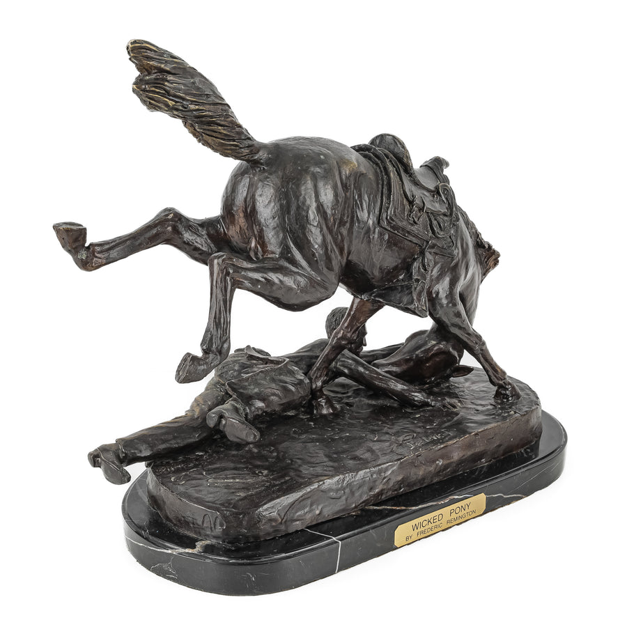 After Frederic Remington "Wicked Pony" Cast bronze on marble base
