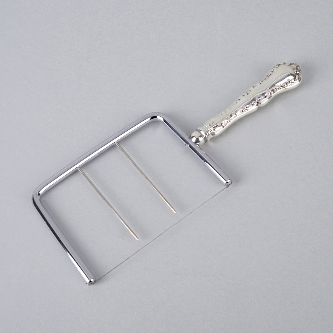 BIRKS Louis XV Sterling Handle Stainless Steel Cheese Cutter