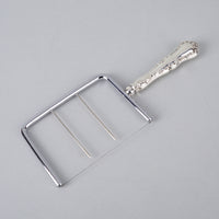 BIRKS Louis XV Sterling Handle Stainless Steel Cheese Cutter