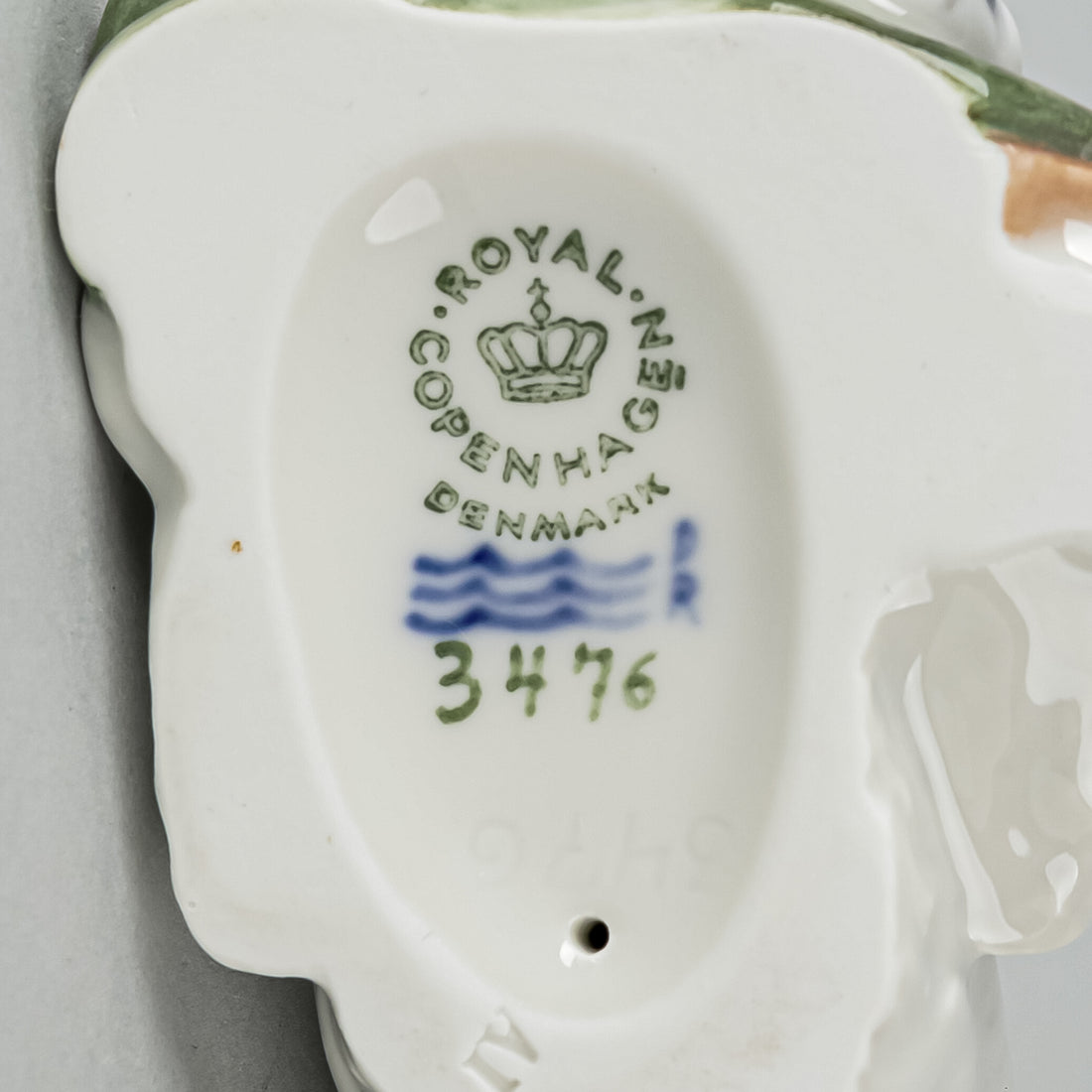 ROYAL COPENHAGEN Figurine Dog With Slipper 3476