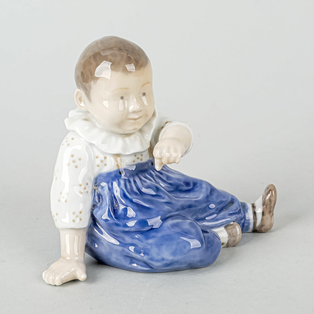 ROYAL COPENHAGEN Figurine Child With Blue Pants 1517