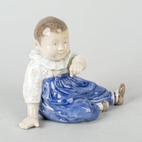 ROYAL COPENHAGEN Figurine Child With Blue Pants 1517