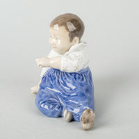ROYAL COPENHAGEN Figurine Child With Blue Pants 1517