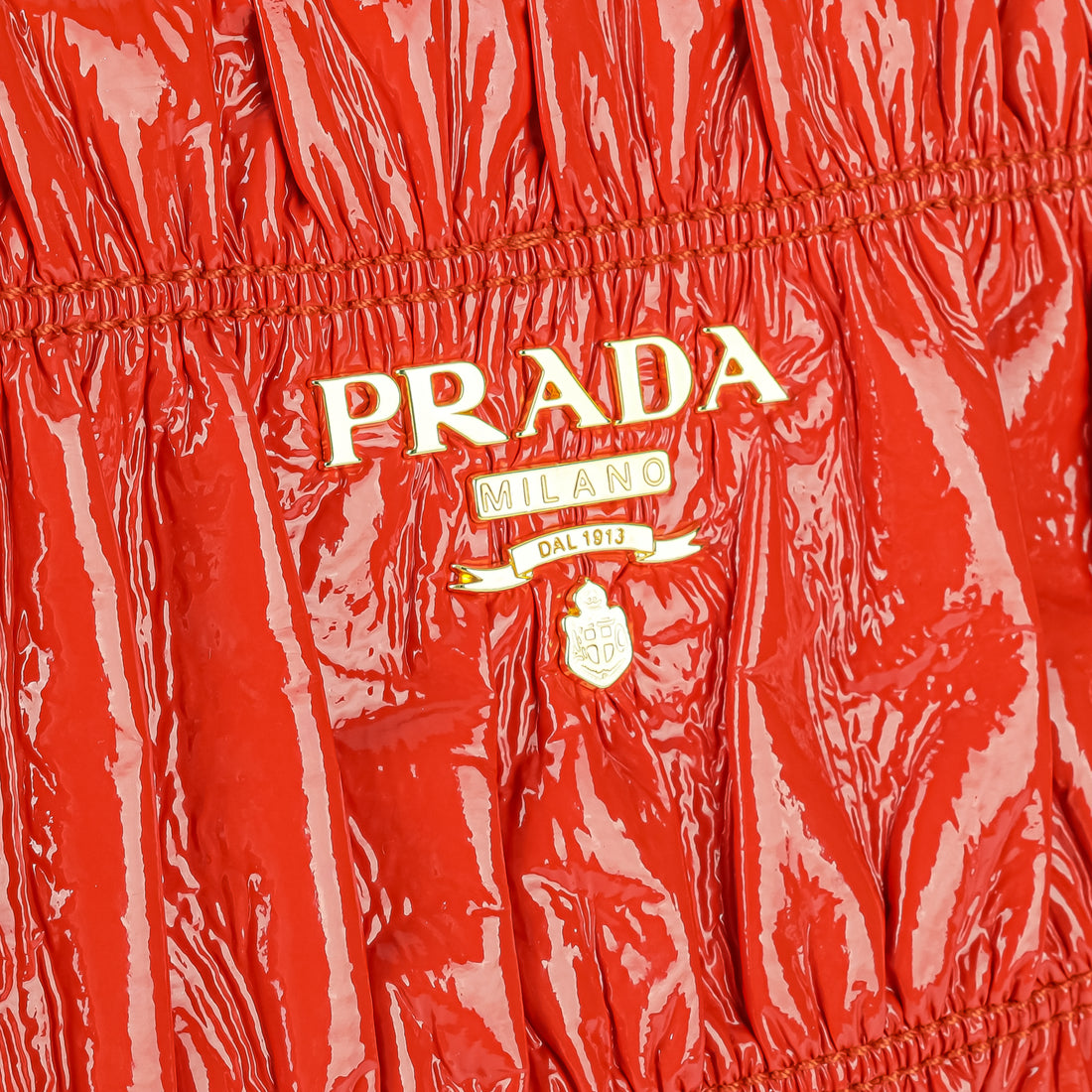 PRADA Vernice Gaufre Clutch - Orange Patent Leather