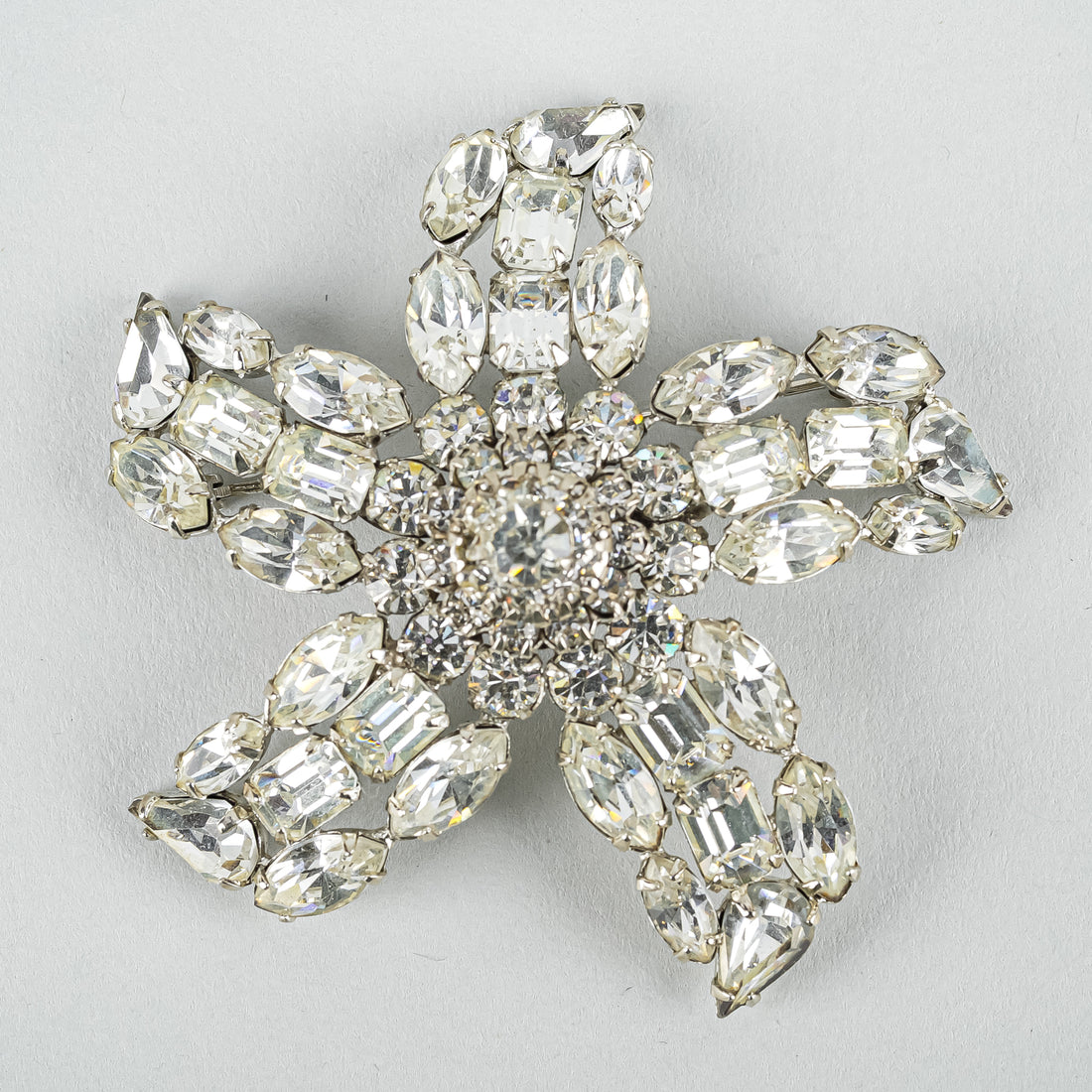 SHERMAN Silver Tone Clear Rhinestones Starfish Brooch