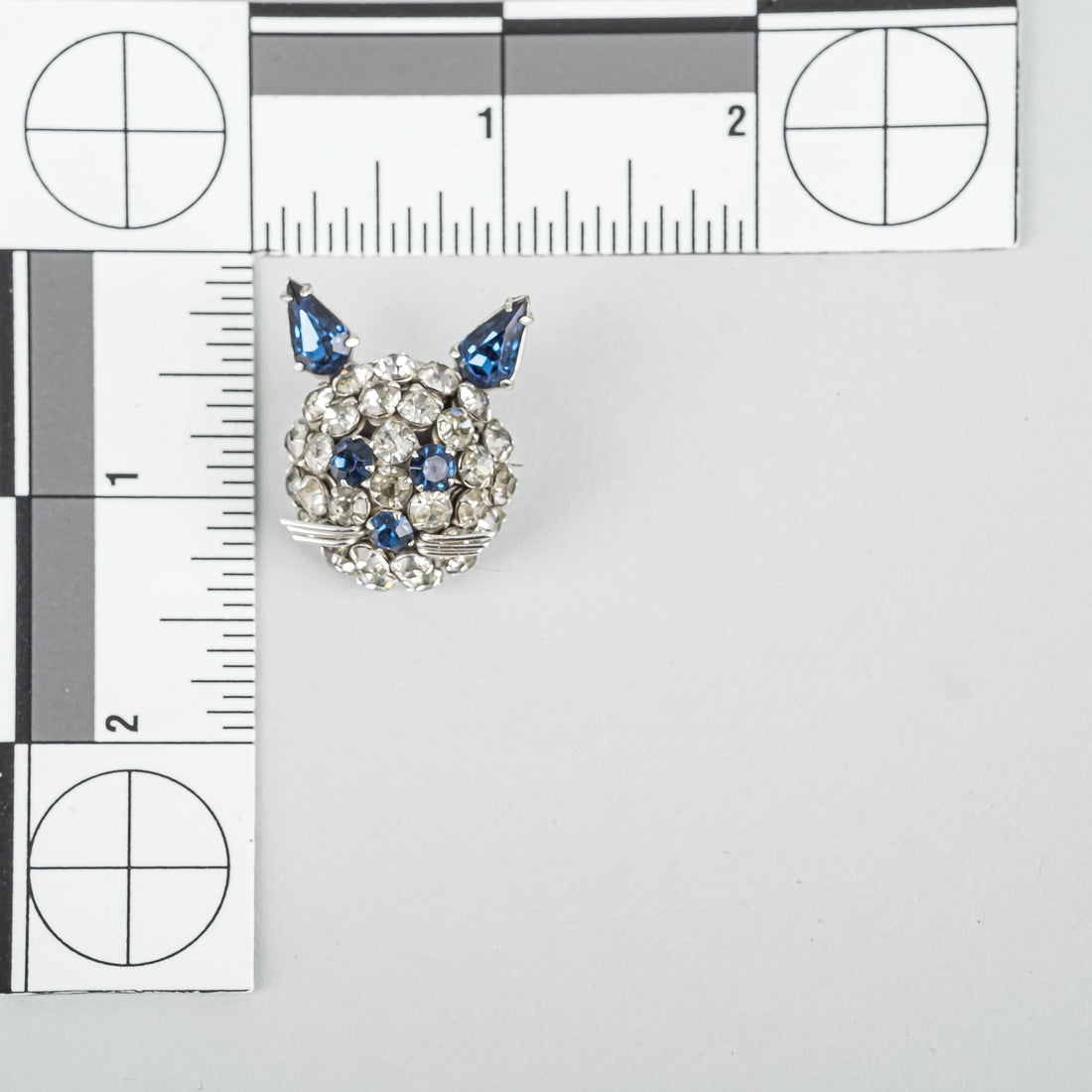 SHERMAN Silver Tone Clear Blue Rhinestone Cat Face Brooch