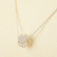 TIFFANY & CO Sterling Silver Tiffany Twist Knot Pendant Necklace