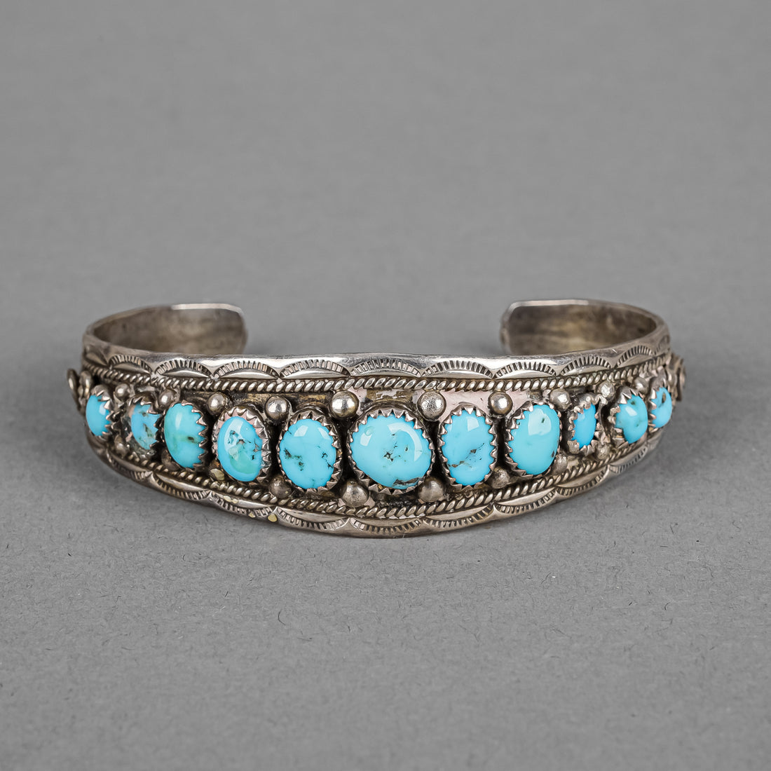 MICHAEL MENDOZA N Navajo Sterling Silver Graduated Turquoise Cuff