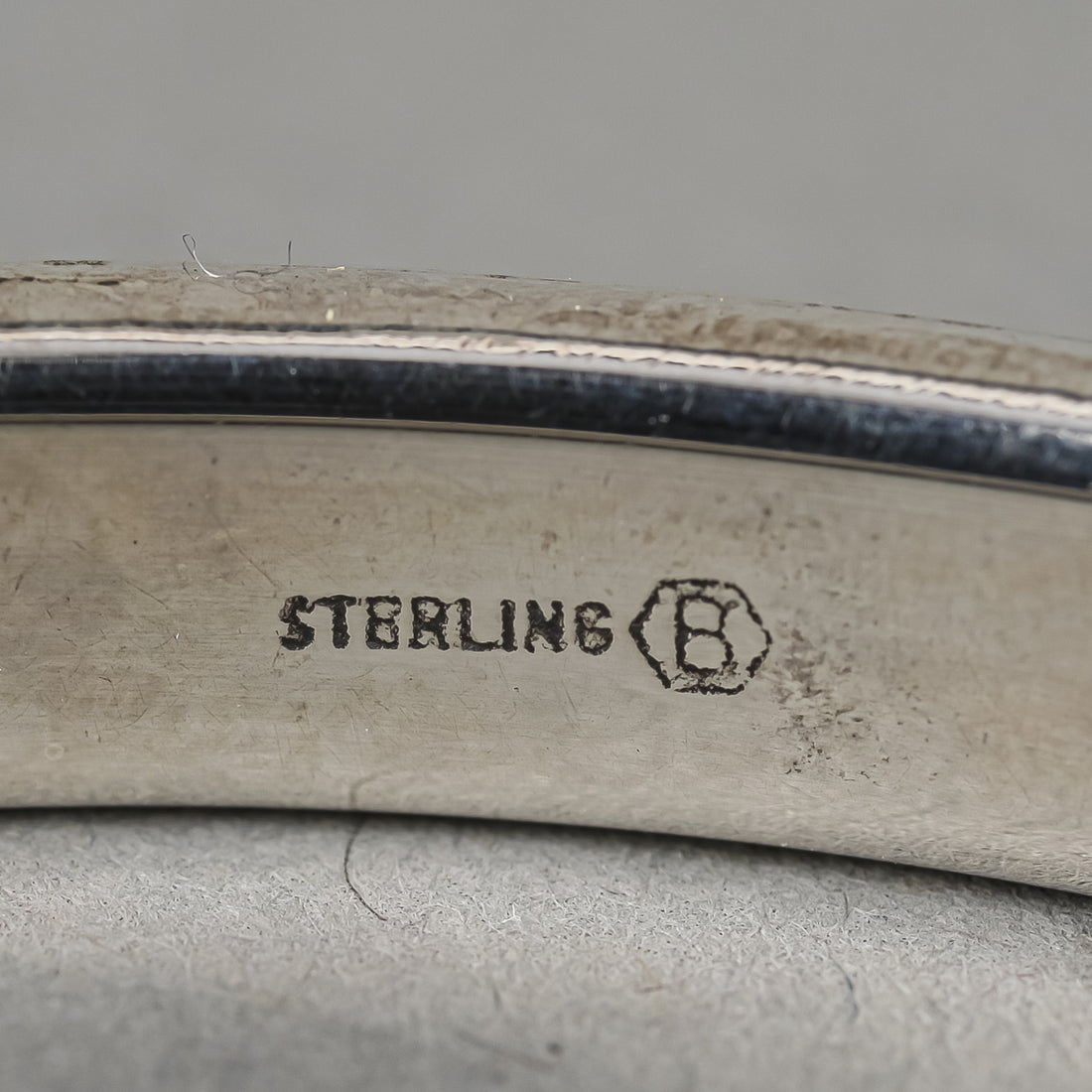 BURKHARDT Sterling Silver Chased Hinged Bangle