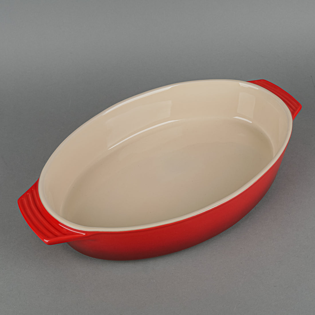 LE CREUSET Stoneware Oval Covered Casserole Red