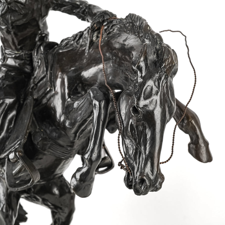 After Frederic Remington (American 1861-1909) "Bronco Buster"