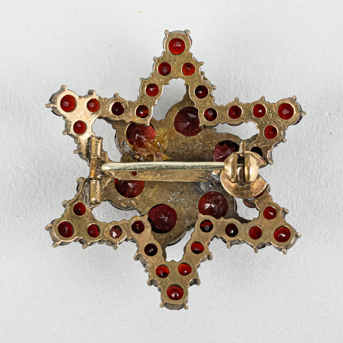 Brass Alloy Bohemian Garnet Star Brooch