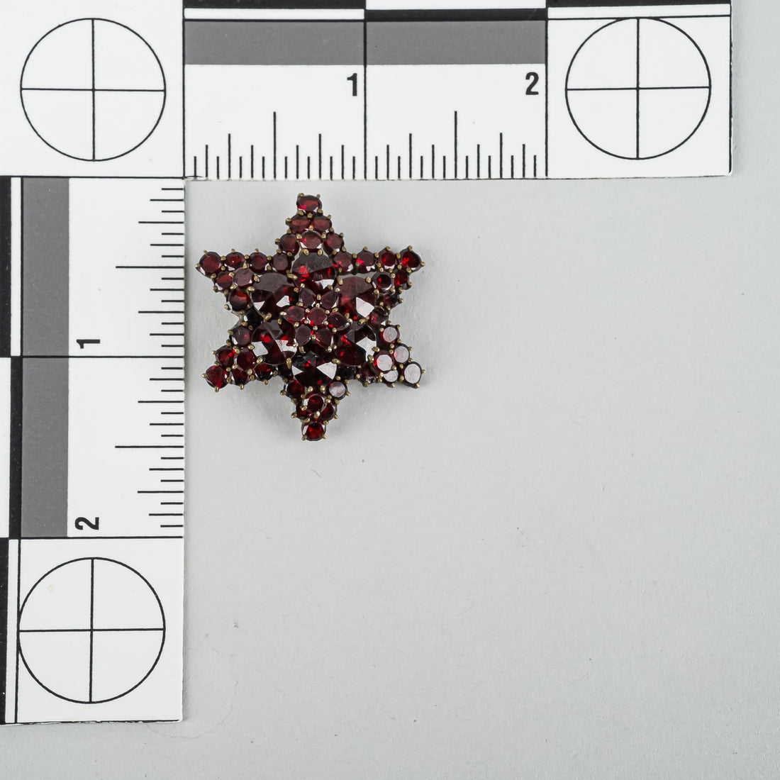 Brass Alloy Bohemian Garnet Star Brooch