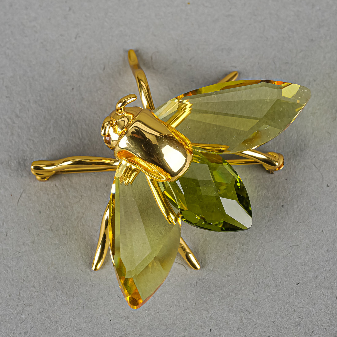 DANIEL SWAROVSKI Gold Tone Green Crystal Moth