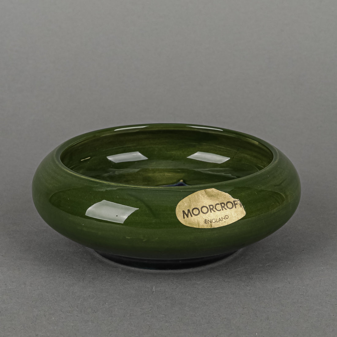 MOORCROFT Clematis Green/Blue Ground Rolled Edge Bowl