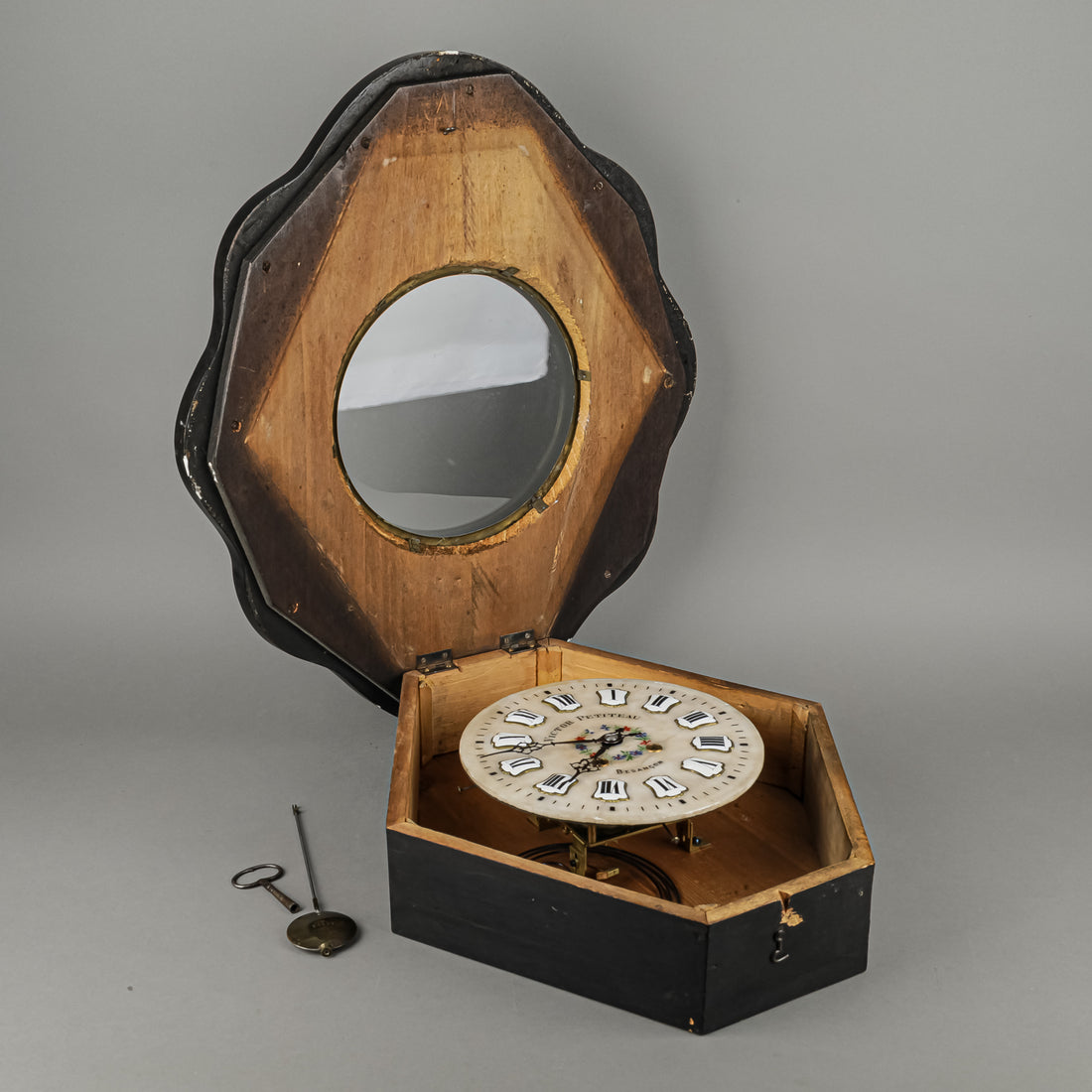 VICTOR PETITEAU Stone Face Hand Painted And Enamel Wall Clock