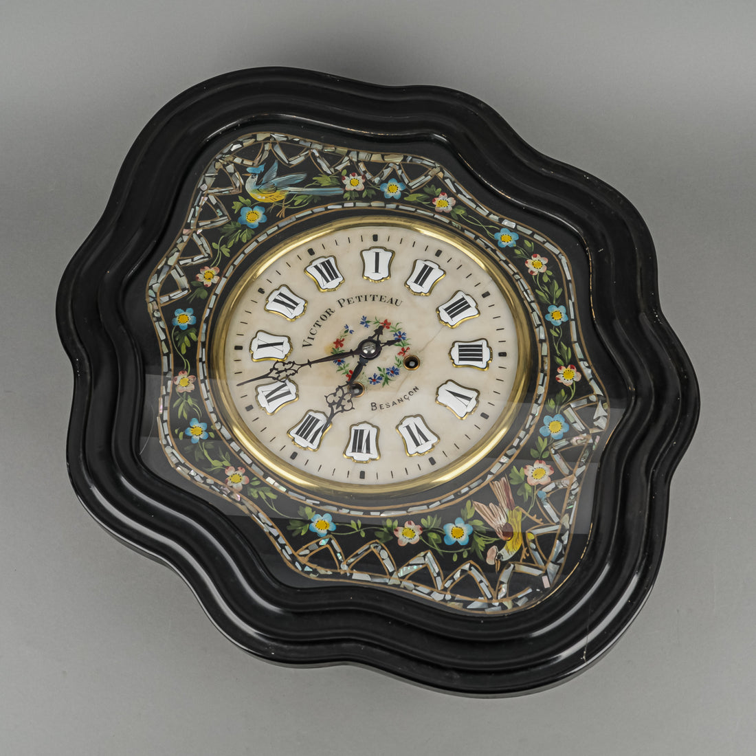 VICTOR PETITEAU Stone Face Hand Painted And Enamel Wall Clock