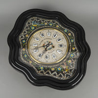 VICTOR PETITEAU Stone Face Hand Painted And Enamel Wall Clock