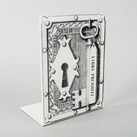 FORNASETTI Libri Proibiti Enamelled Bookend