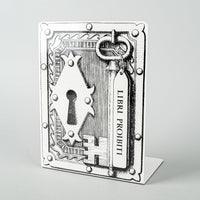 FORNASETTI Libri Proibiti Enamelled Bookend