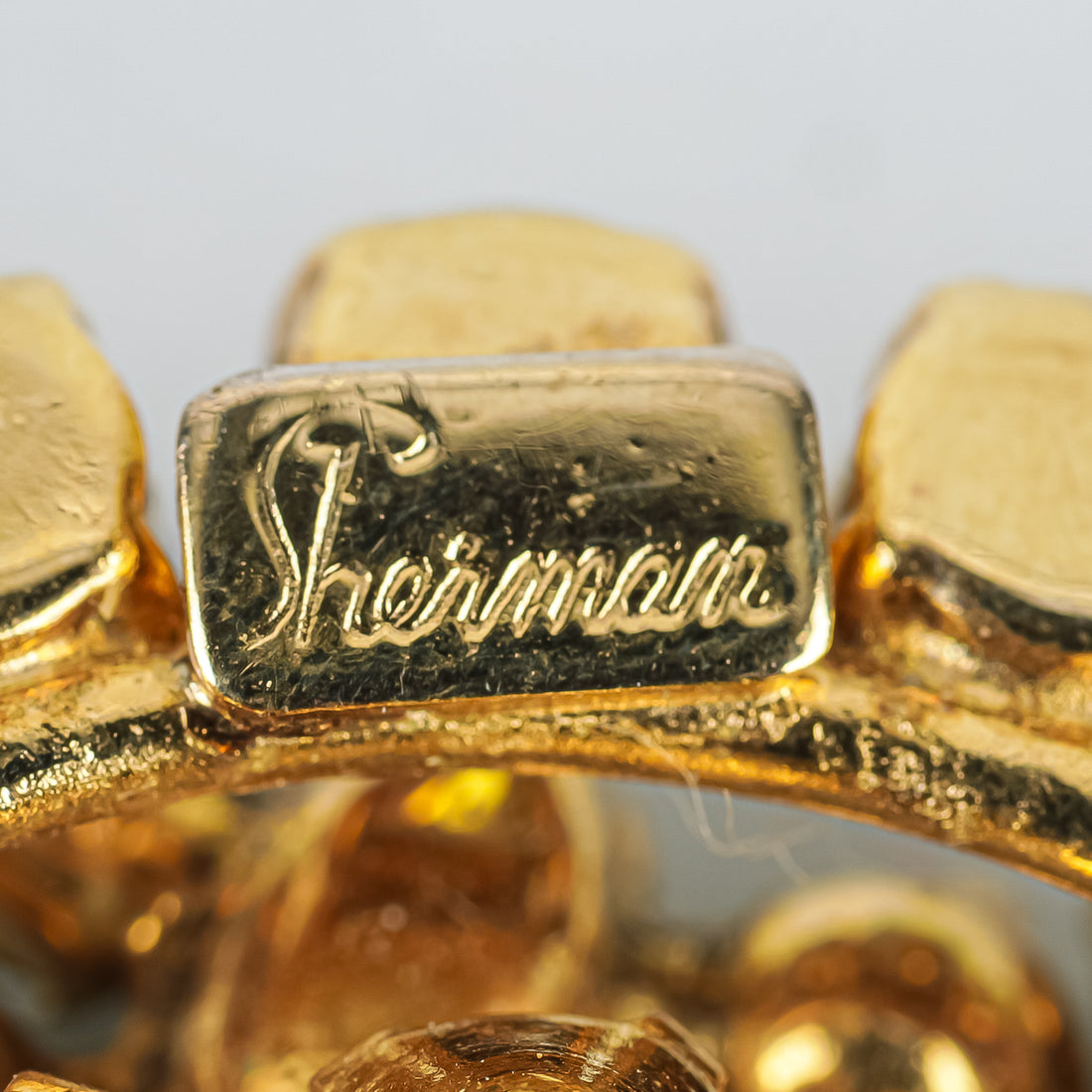 SHERMAN Gold Tone AB Wreath Brooch