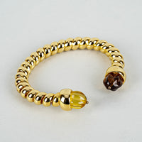 MONET Gold-Tone Brown Orange Resin Cuff Bracelet