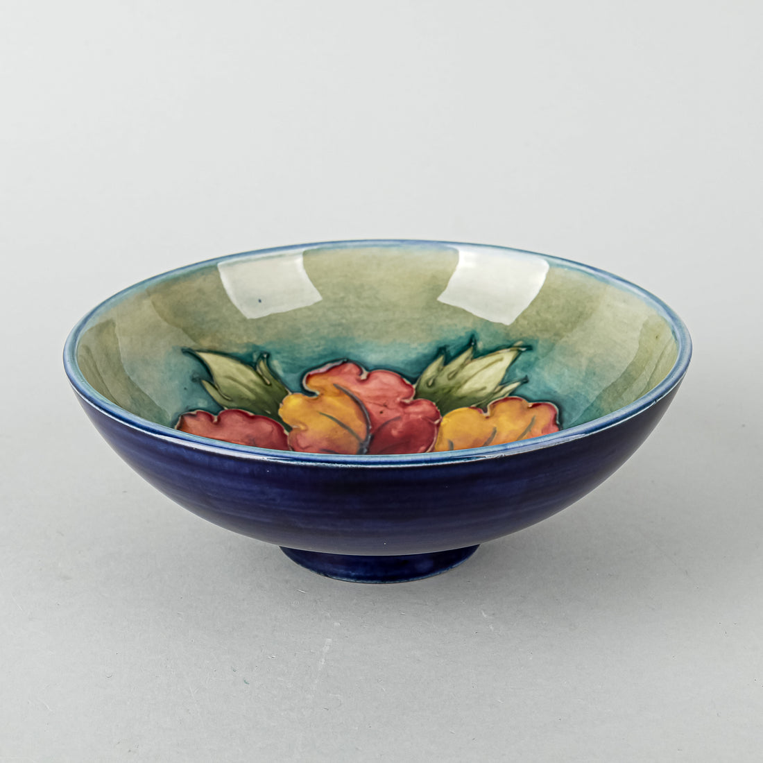 MOORCROFT Hibiscus Green/Blue Ground Footed Bowl