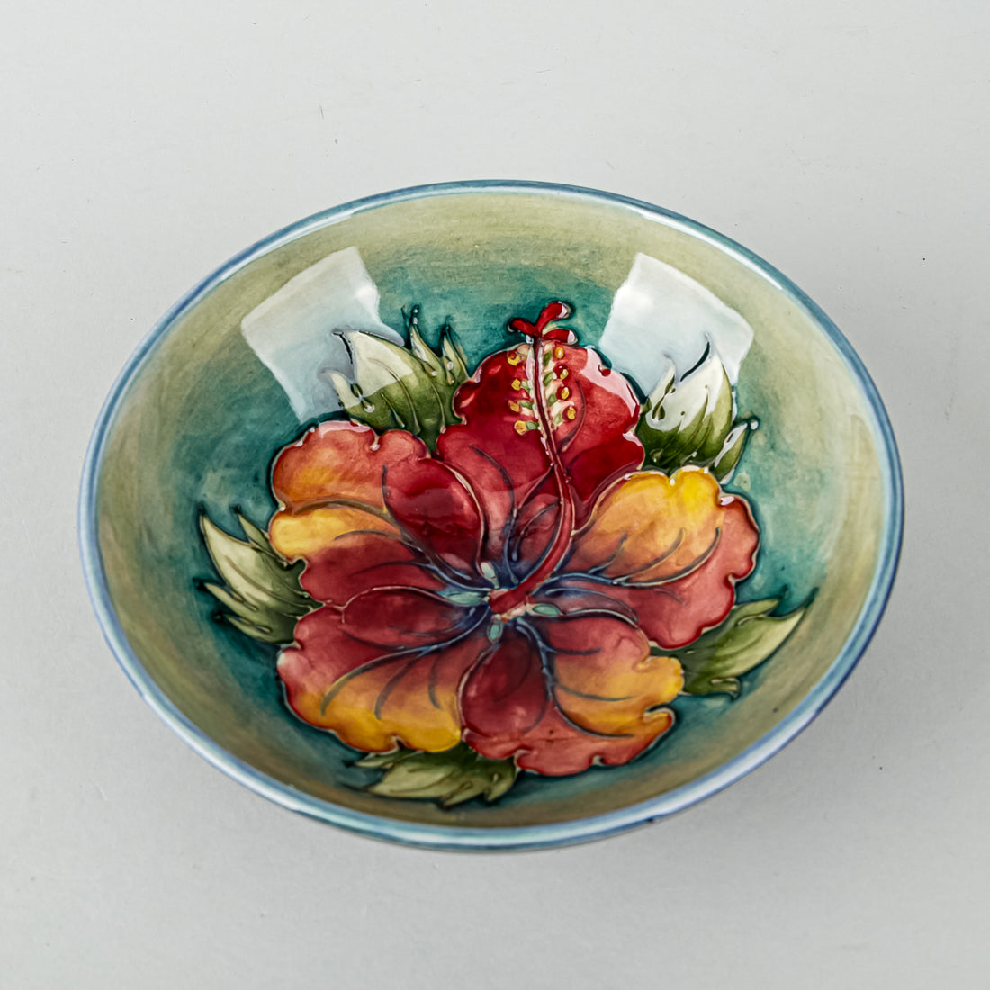 MOORCROFT Hibiscus Green/Blue Ground Footed Bowl