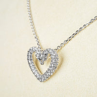 SWAROVSKI Silver Tone 2Swan Heart Pendant Necklace