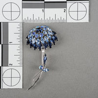SHERMAN Silver-Tone Blue Rhinestone Flower Brooch