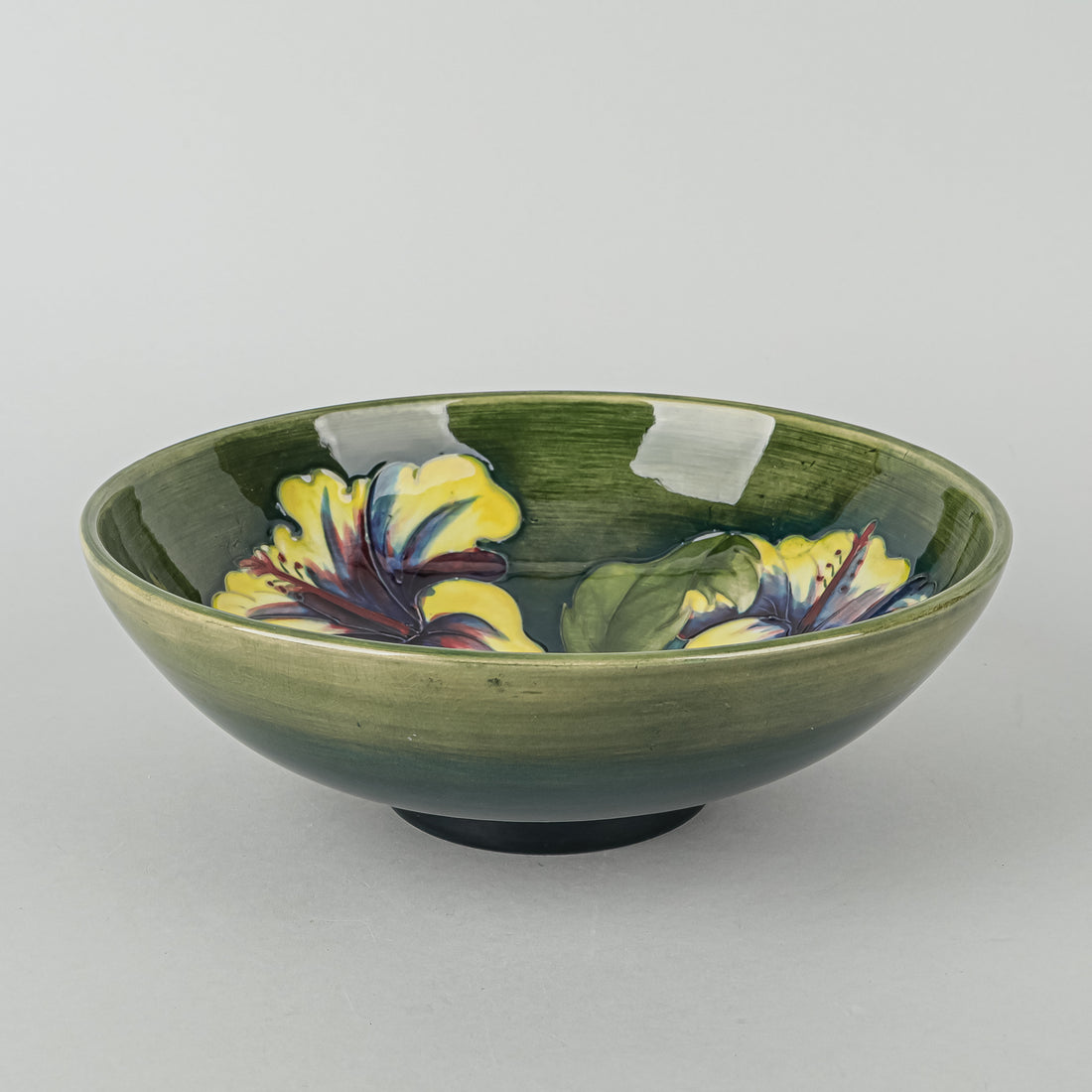 MOORCROFT Hibiscus With Green Ground Footed Bowl