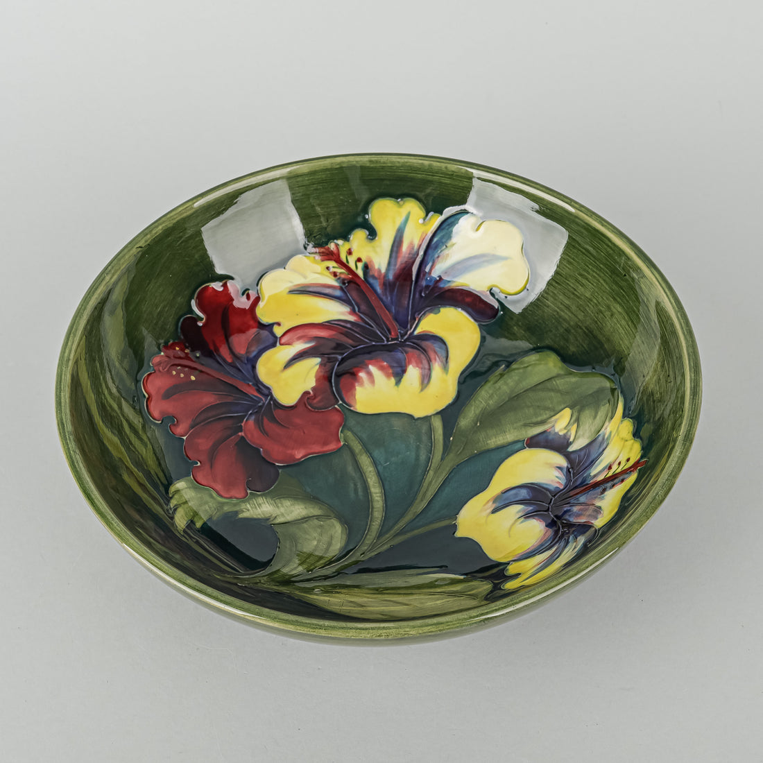 MOORCROFT Hibiscus With Green Ground Footed Bowl