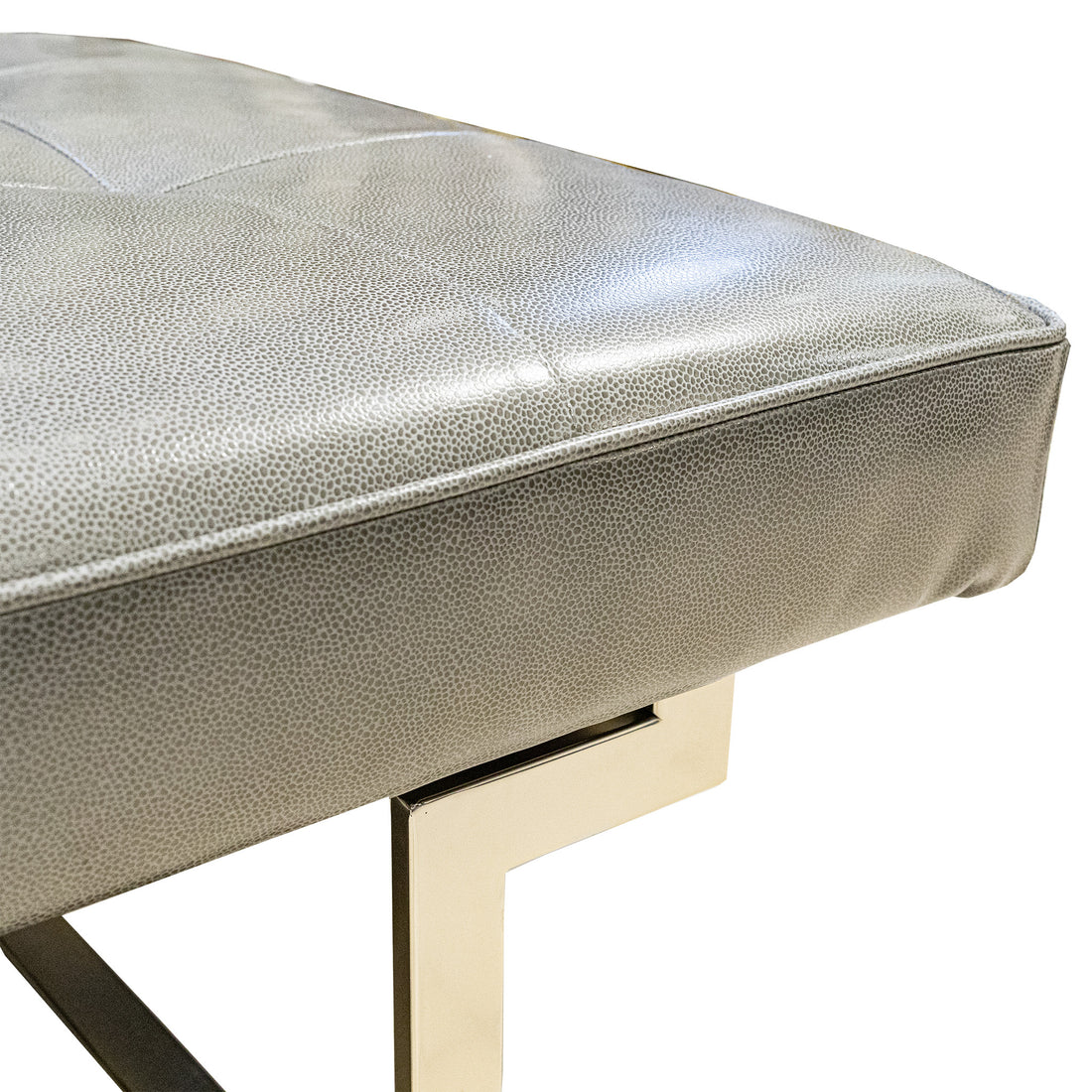 Grey Vinyl And Chrome Ottoman