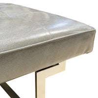 Grey Vinyl And Chrome Ottoman
