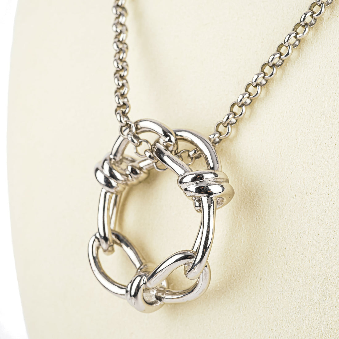 BALENCIAGA Silver Tone Continuity Bow Round Pendant Necklace