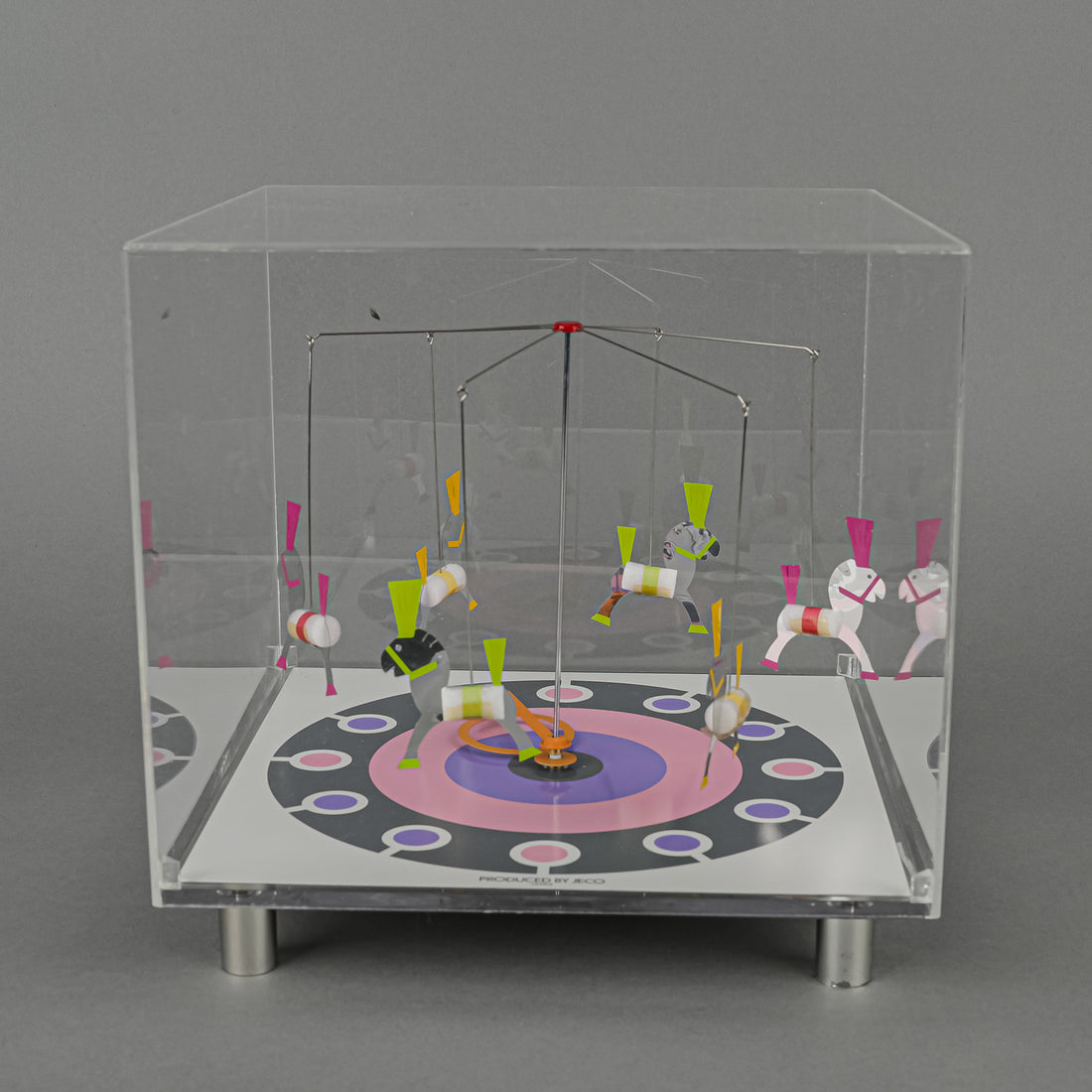 PRODUCED BY JECO Merry Go Round Kinetic Action Clock