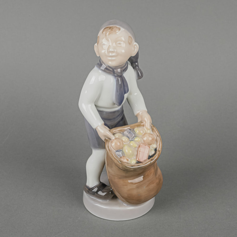ROYAL COPENHAGEN Figurine Boy With Sack Of Gifts 4534