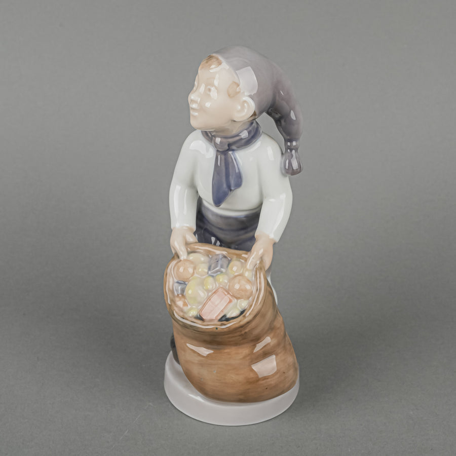 ROYAL COPENHAGEN Figurine Boy With Sack Of Gifts 4534