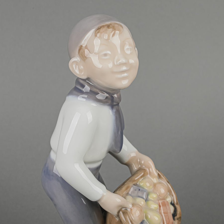 ROYAL COPENHAGEN Figurine Boy With Sack Of Gifts 4534