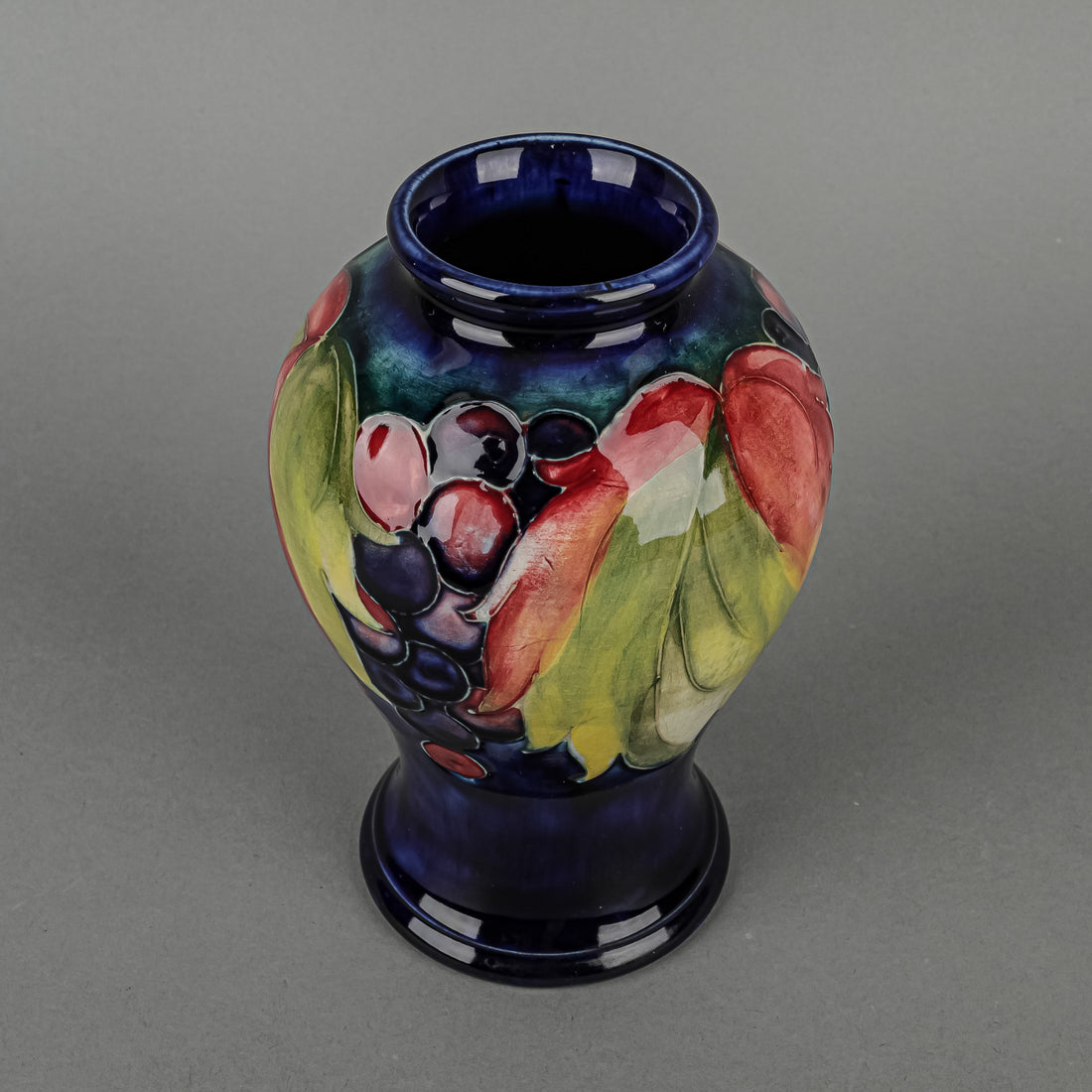 MOORCROFT Leaf & Fruit Blue Ground Vase