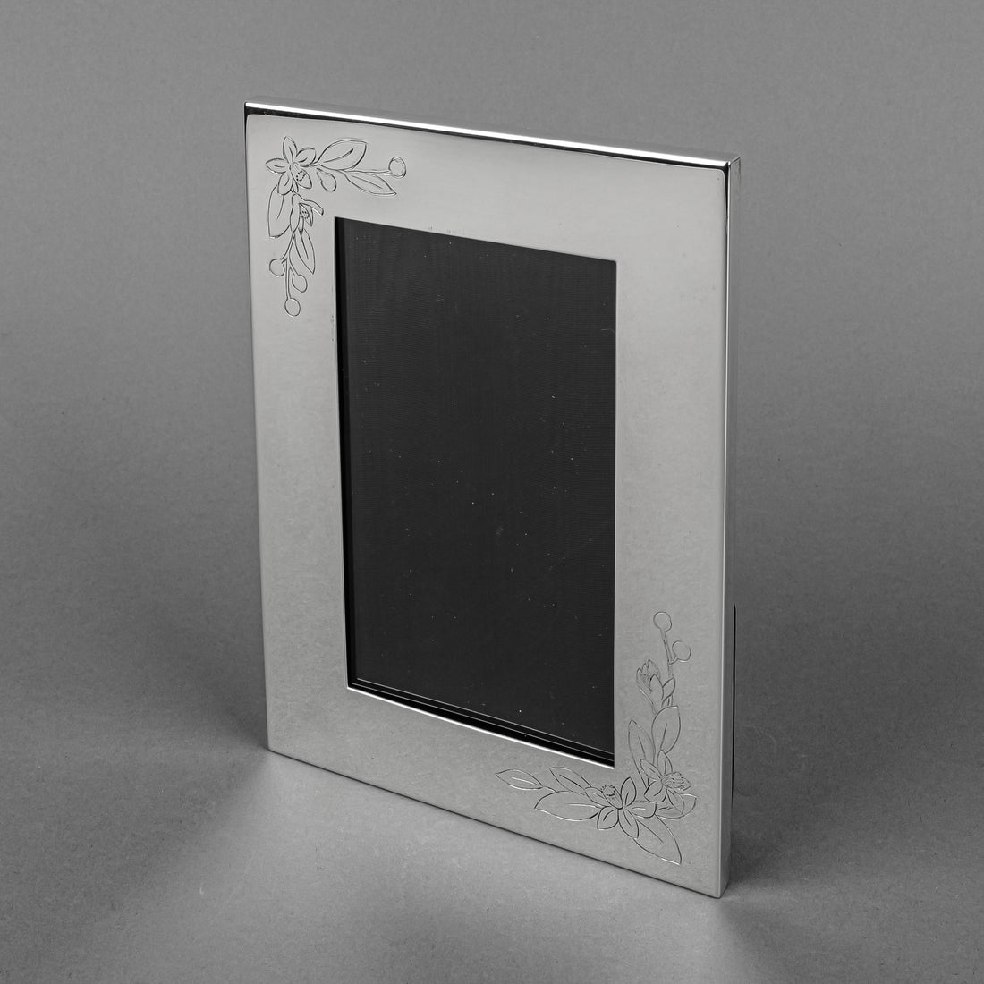 TIFFANY & CO Sterling 3"x5" Picture Frame With Leather Back