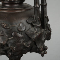 Pair of Bronze Embossed Grapevine Motif Vases